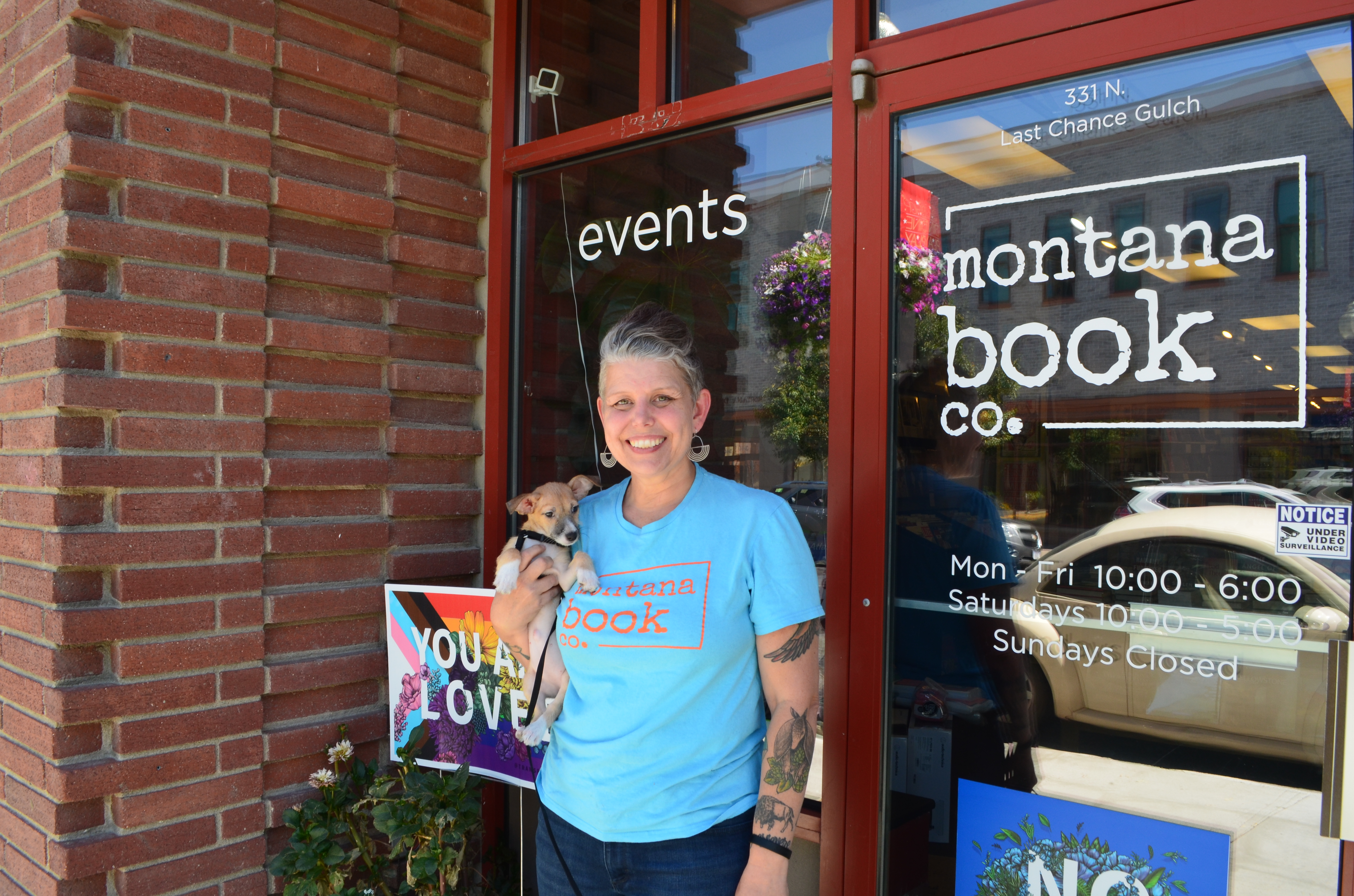 Chelsia Rice, co-owner of Montana Book Company, with Cricket